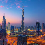 An aerial view of the Burj Khalifa and downtown Dubai at sunset, a scenic spot that reassures those asking is Dubai safe for solo female travellers.