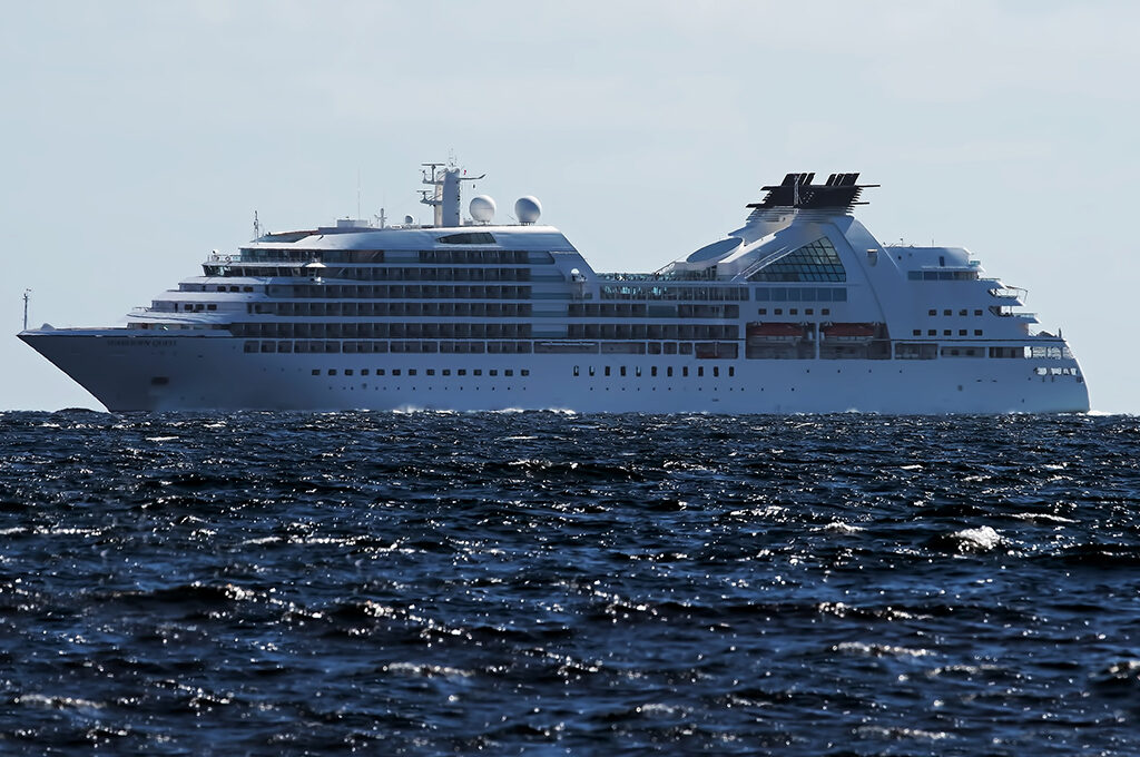 A view of a Seabourn vessel at sea, representing one of the best luxury cruise lines for couples.