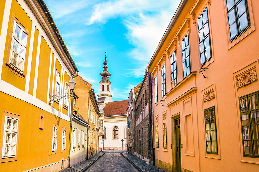 Budapest old town pastel buildings,Best Free Things to Do in Budapest-VGUK Blog