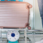 Airport check in desk with luggage,British Airways Baggage Policy - VGUK Blog