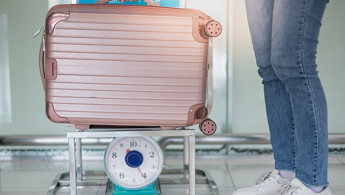 Airport check in desk with luggage,British Airways Baggage Policy - VGUK Blog