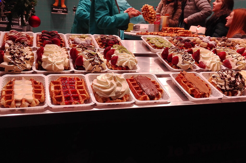 Belgian waffles and hot chocolate on a wooden Christmas market stall,Brussels Christmas Market - VGUK Blog