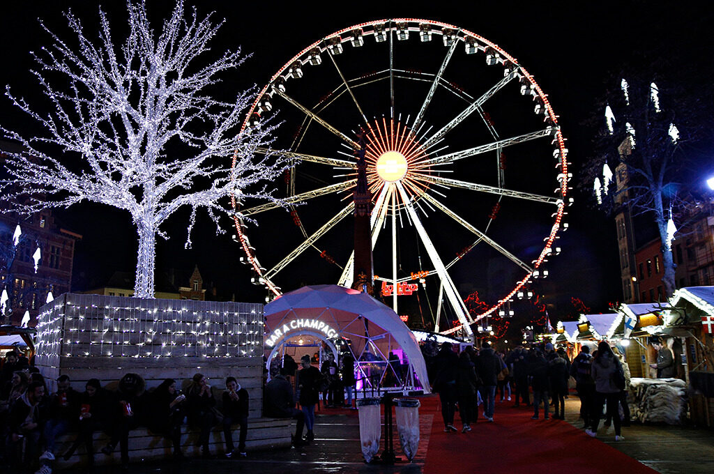 Ferris wheel and ice skating rink lit up at night,Brussels Christmas Market - VGUK Blog
