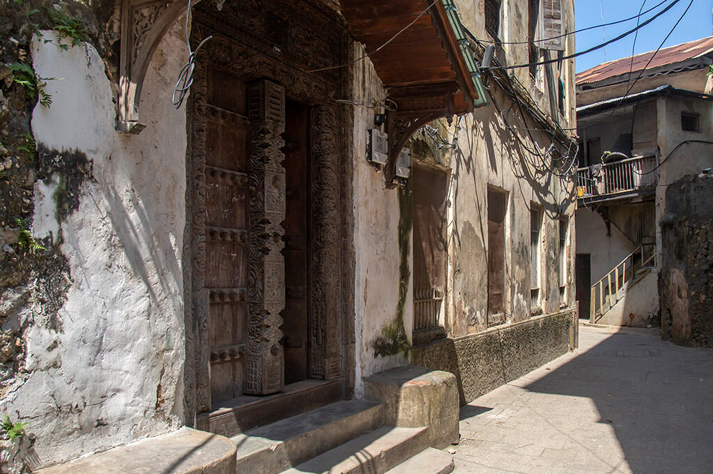 Stone Town Zanzibar narrow streets carved doors,Best Beaches in Zanzibar - VGUK Blog
