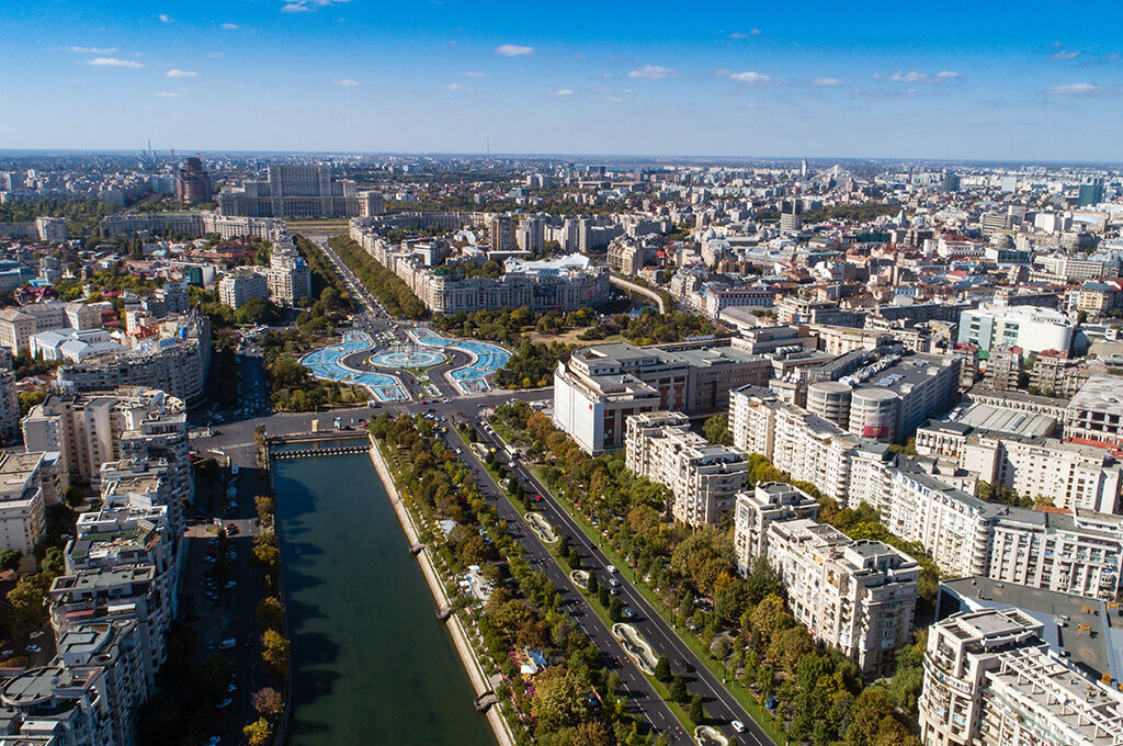 Aerial view of Bucharest featuring Unirii Square and the Palace of Parliament, one of the best Eastern European cities to visit.