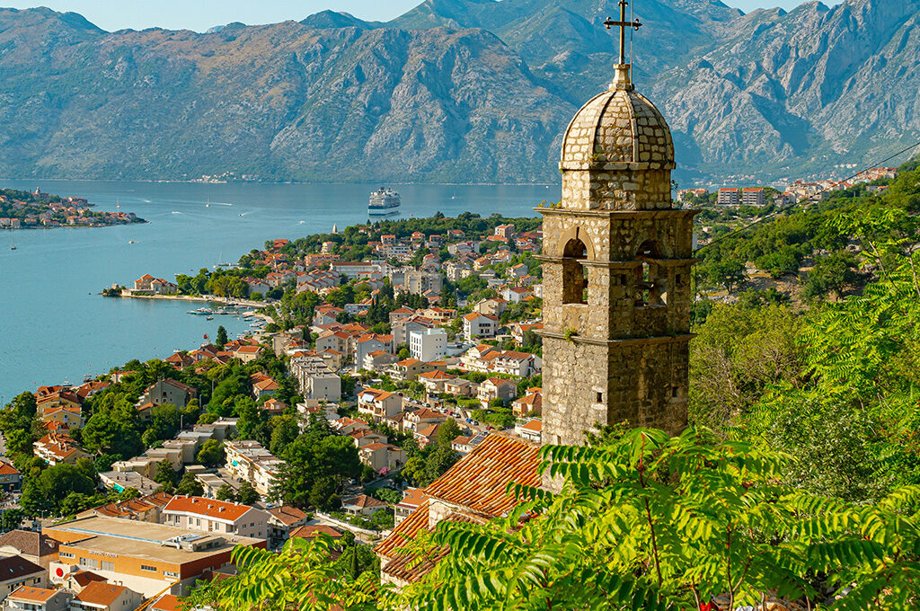 Scenic view of Church of Our Lady of Remedy overlooking the Bay of Kotor, featured among the best Eastern European cities to visit.