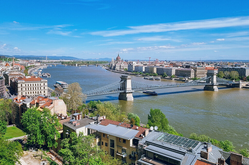 Panoramic river view of Budapest, Hungary, highlighted as one of the best Eastern European cities to visit.