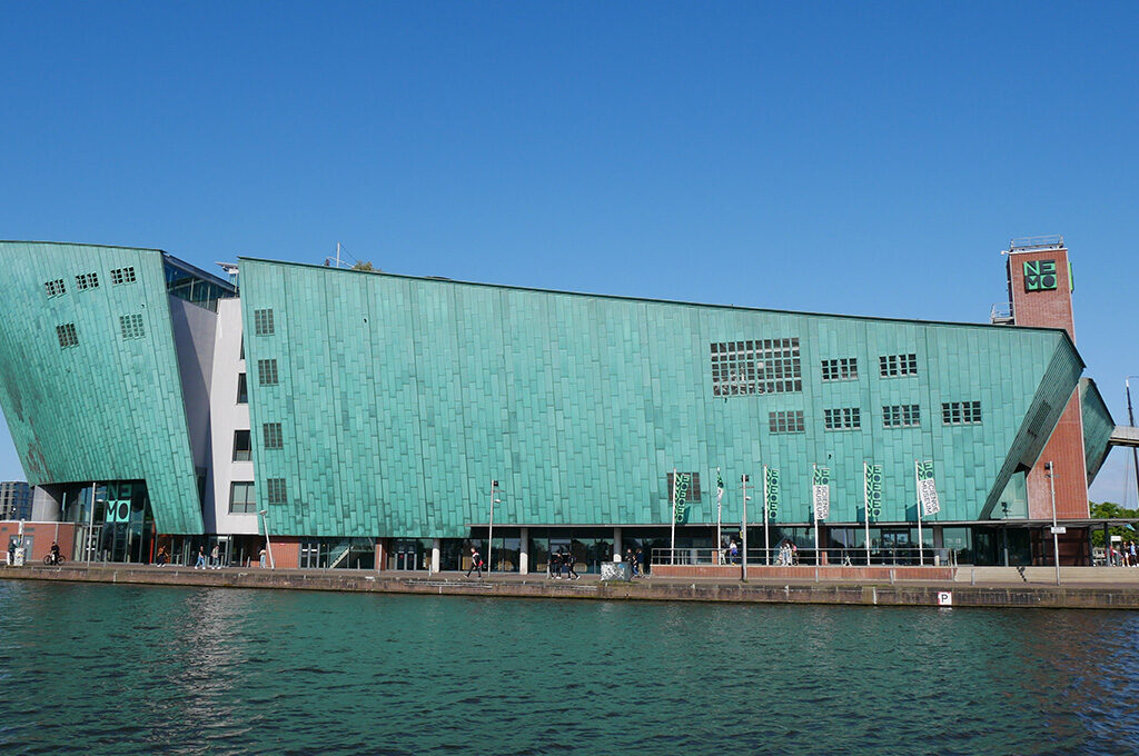 NEMO Science Museum Amsterdam’s distinctive modern turquoise building on the waterfront - top-rated places to visit in Netherlands with family for hands-on interactive exhibits.